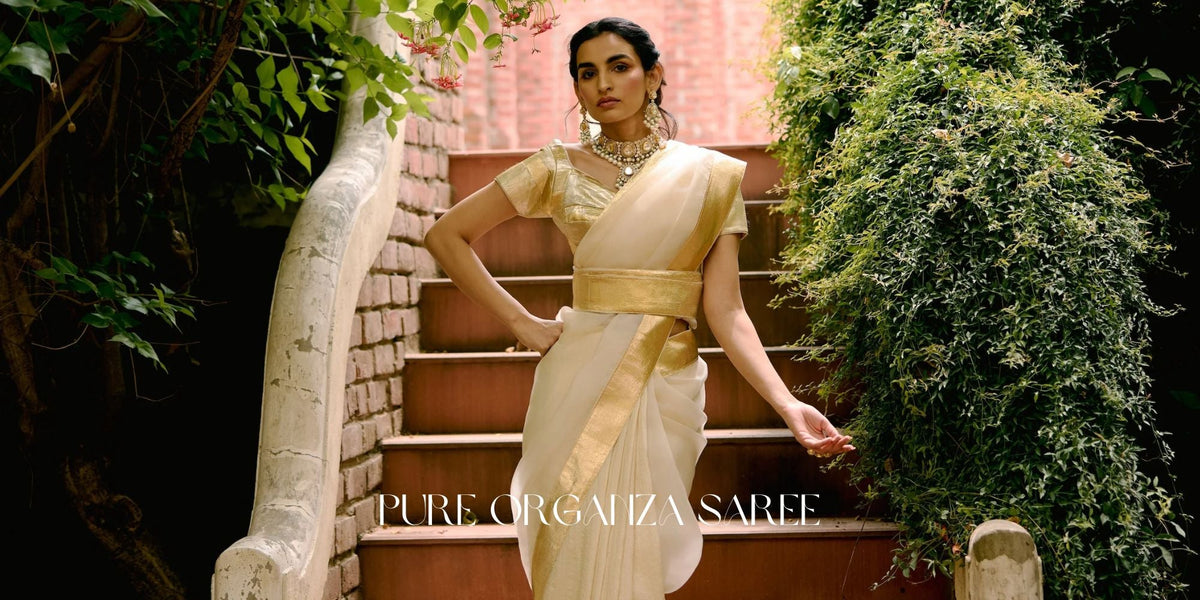 Pure organza saree with soft natural sheen and crisp drape