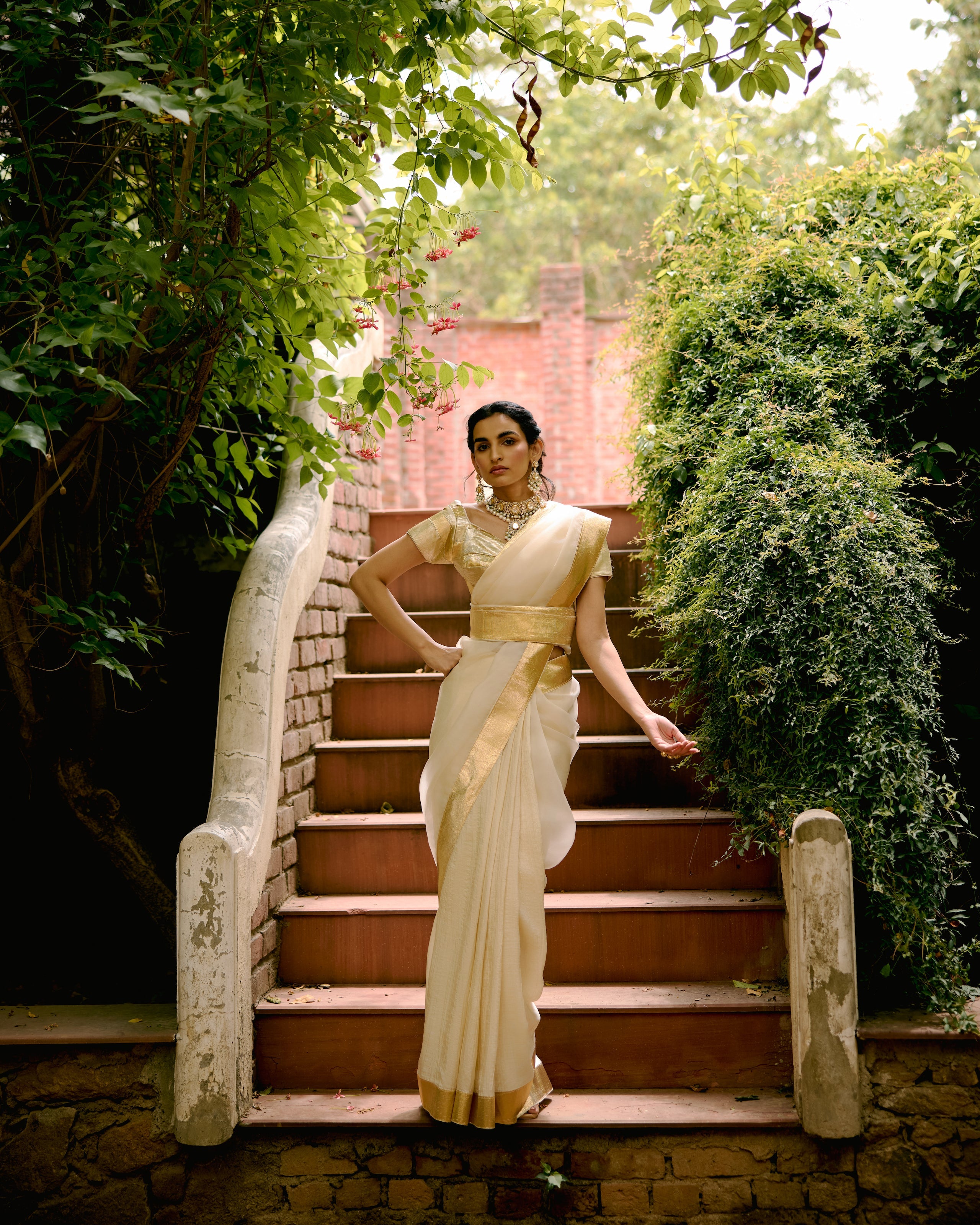 Ivory Organza Saree with Lumpi Border
