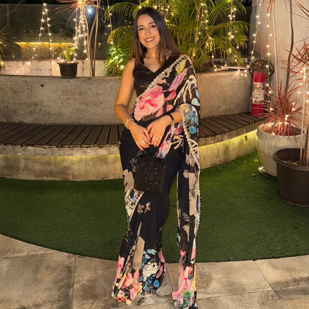 Black floral organza saree for festive wear with elegant design